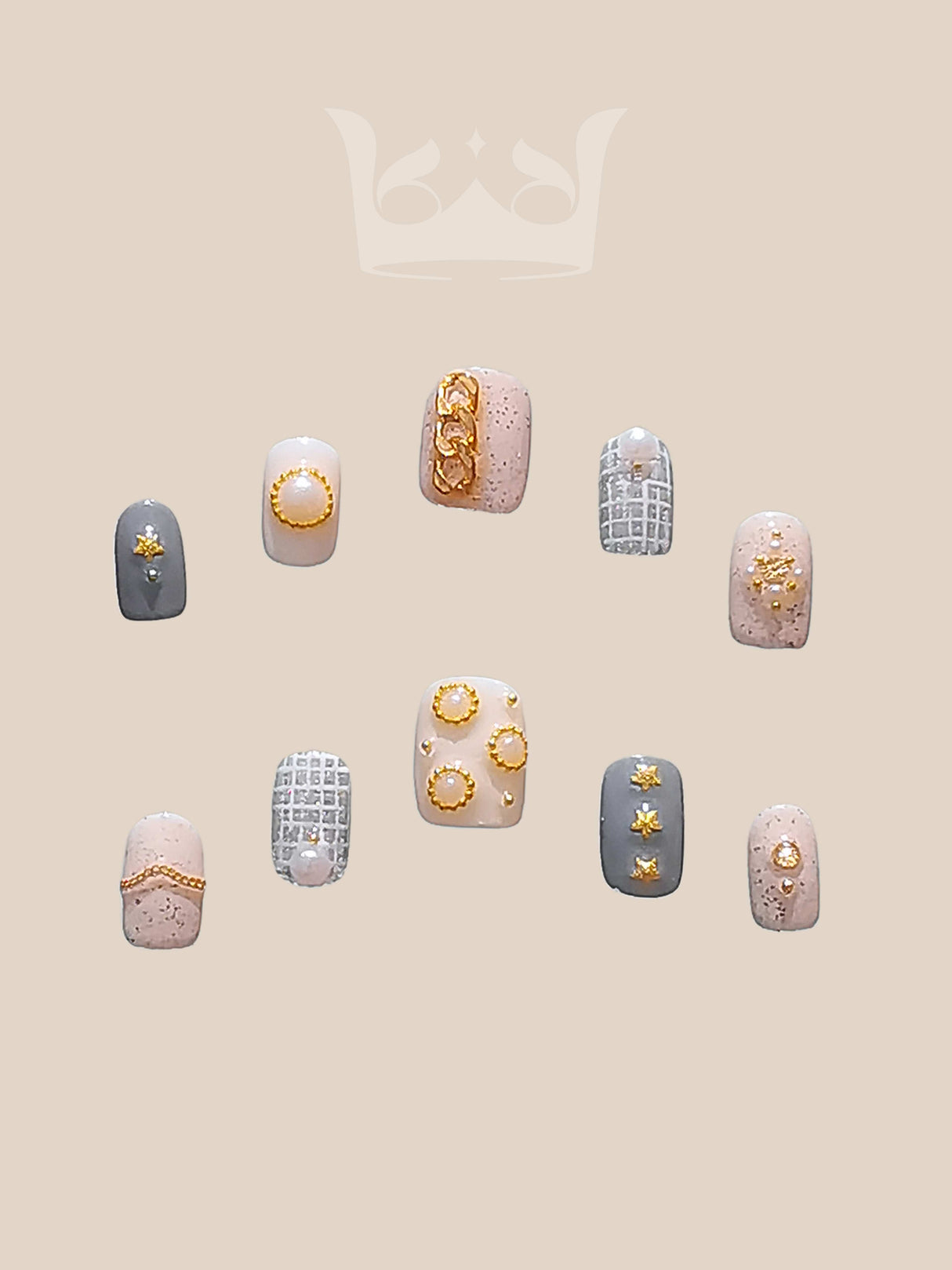 Luxurious nails with a monochromatic color scheme, featuring pearls, rhinestones, geometric patterns, 3D elements, and mixed textures for a high fashion statement.