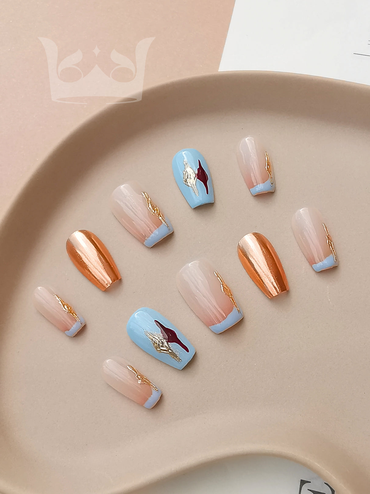 Cute nail art options with modern and stylish designs featuring a combination of colors, embellishments, and metallic finishes for a chic aesthetic.
