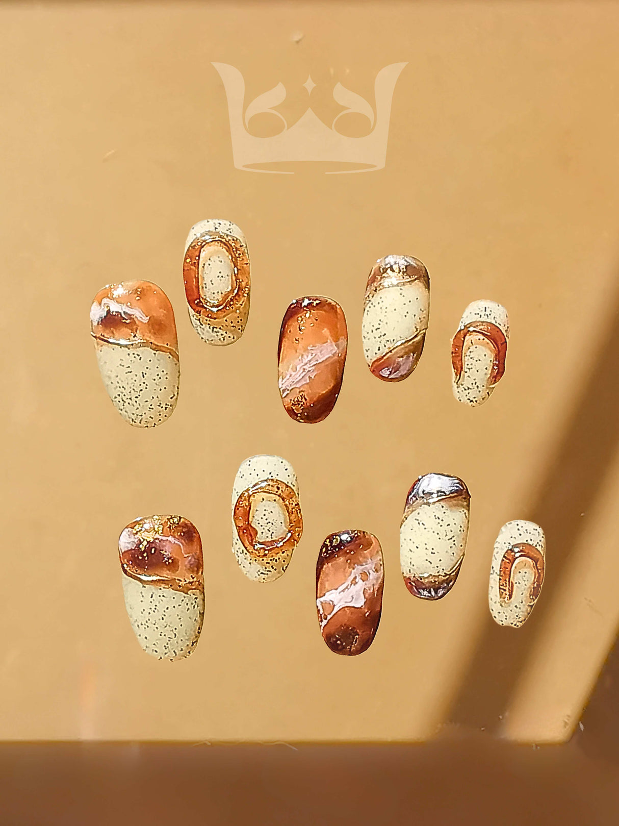 Luxurious acrylic nails with trendy designs for individuals who want to enhance their appearance with elegance and sophistication.