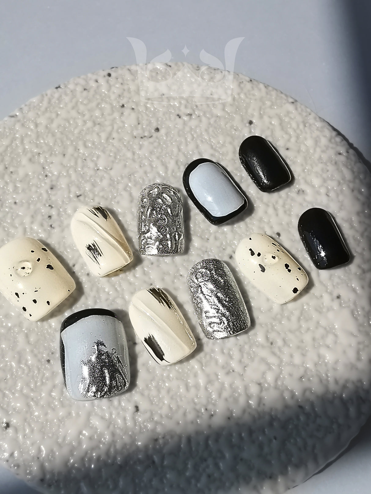 These press-on nails are for cute purposes, such as for a special occasion or personal expression. They feature a mix of design elements for a modern and artistic look.