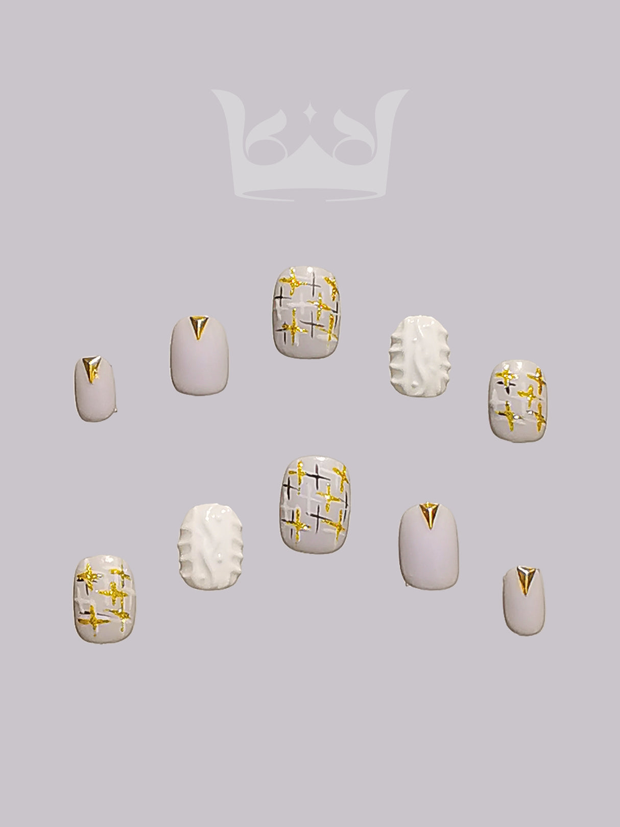 These press-on nails come in a versatile color palette and with gold metallic accents for a touch of luxury. Ideal for balancing understated elegance with statement-making style.