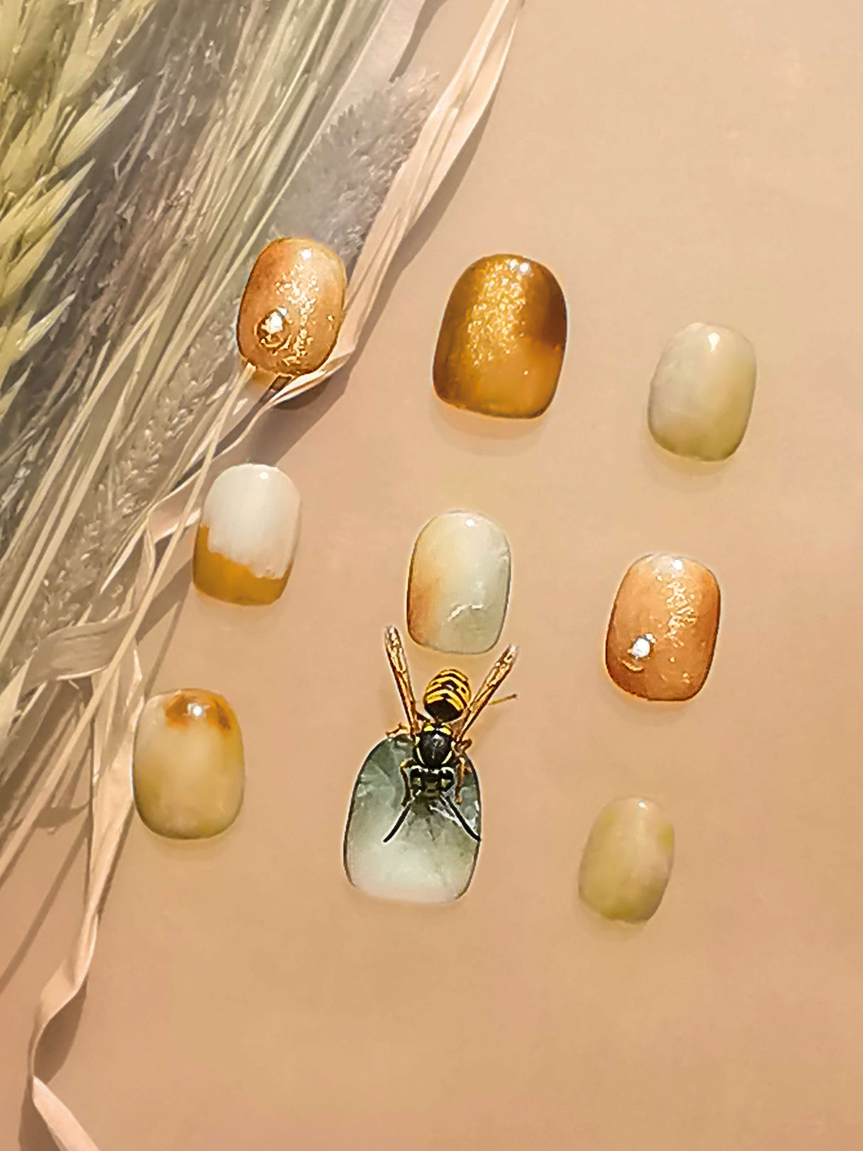 These press-on nails have warm earthy colors, and natural themes, appealing to those who appreciate unique and trendy designs.