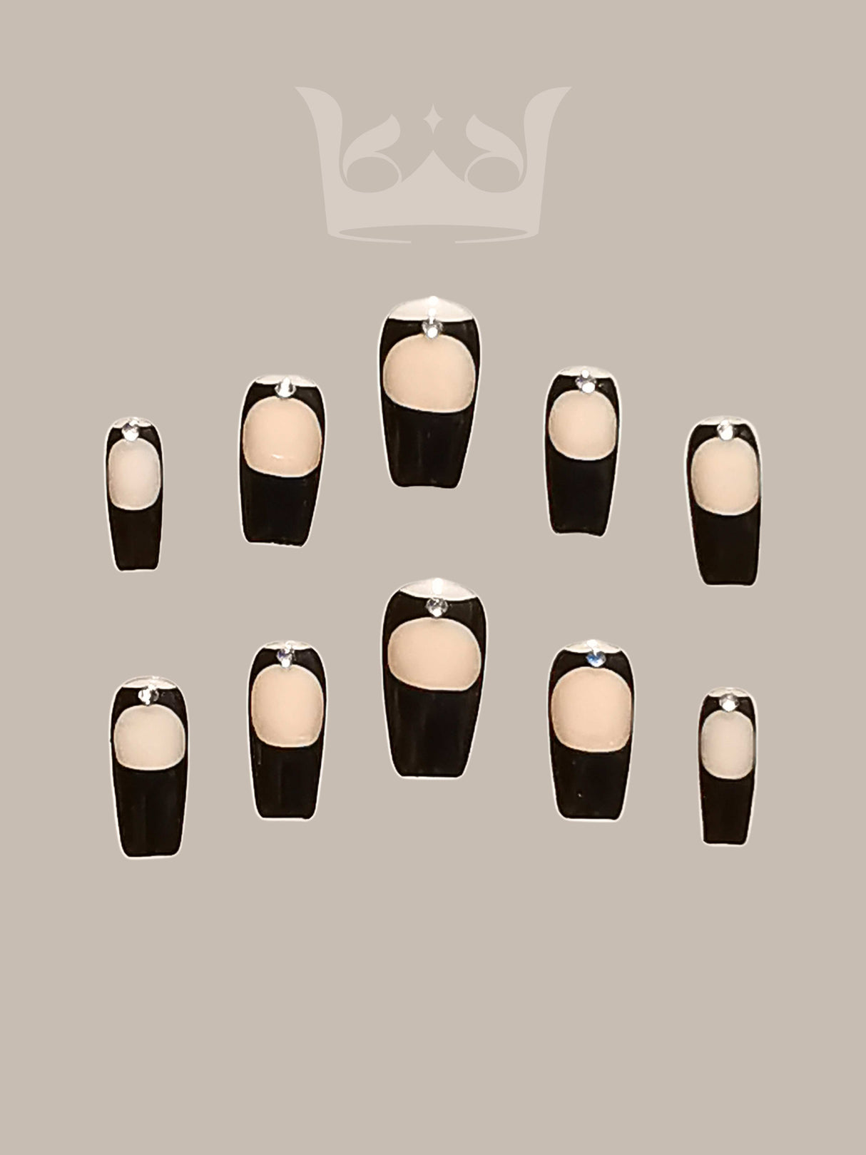 These press-on nails offer a modern twist on the French manicure with dark tips and a nude base, suitable for formal occasions or everyday wear. Square or squoval shape.