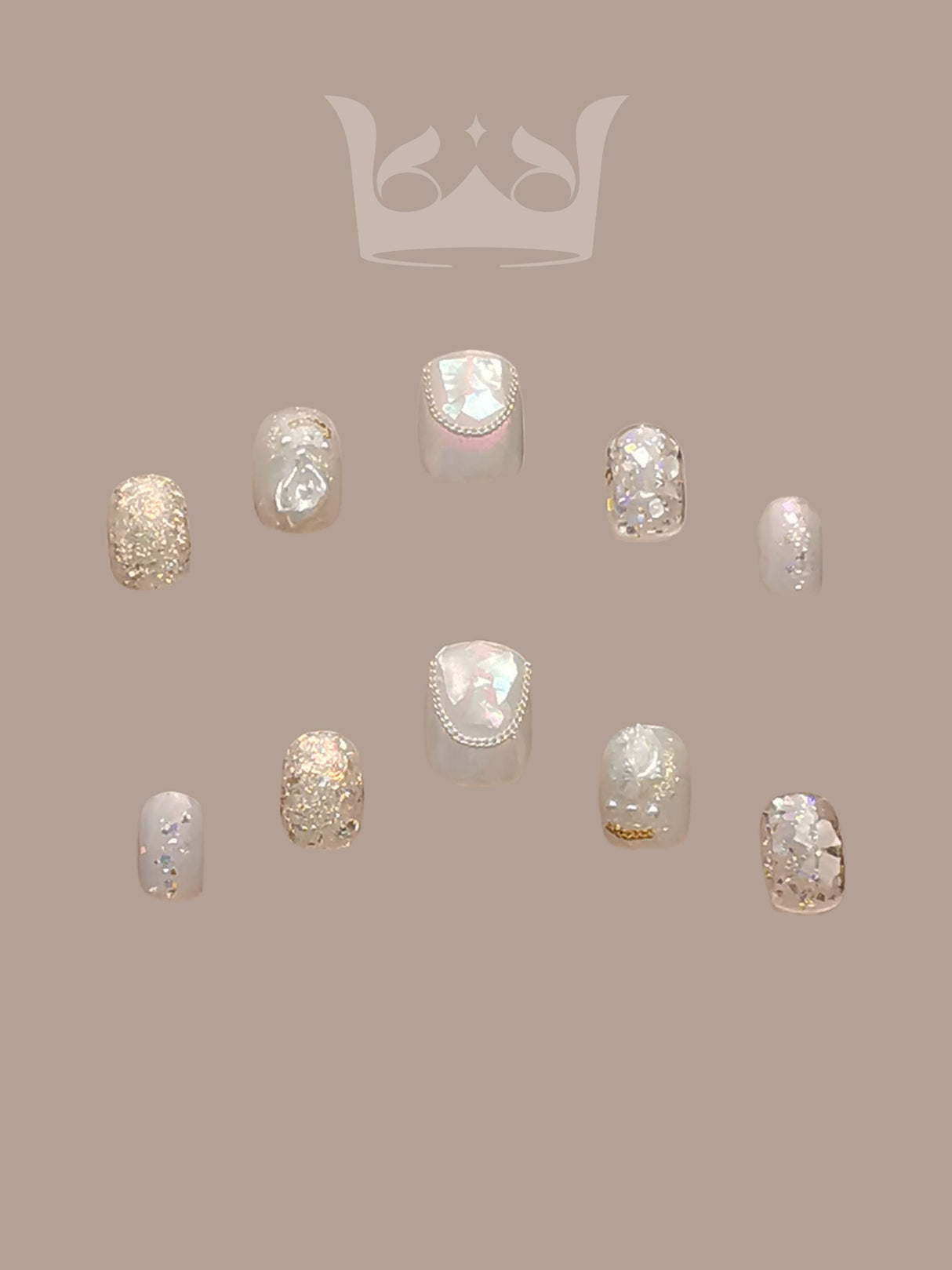Luxurious nails with a monochromatic color scheme, featuring pearls, rhinestones, geometric patterns, 3D elements, and mixed textures for a high fashion statement.