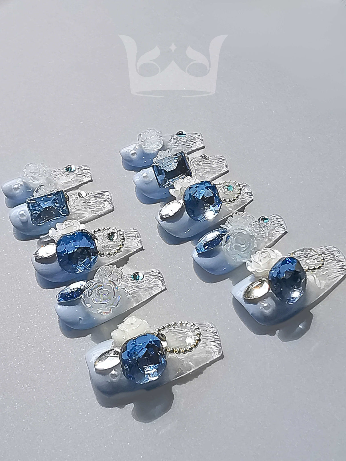 Elaborate and eye-catching nails with diamonds, patterns, textures, and 3D elements are designed for special occasions and showcase creativity and style.