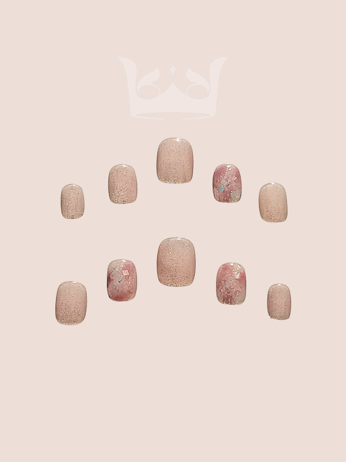 These press-on nails are perfect for special occasions, with a soft pink color, delicate white accents, shimmering finish, iridescent flakes, and a classic shape.