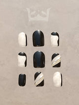 These press-on nails are perfect for fashion-forward individuals who want to make a statement. They have a monochromatic color scheme and versatile design elements.