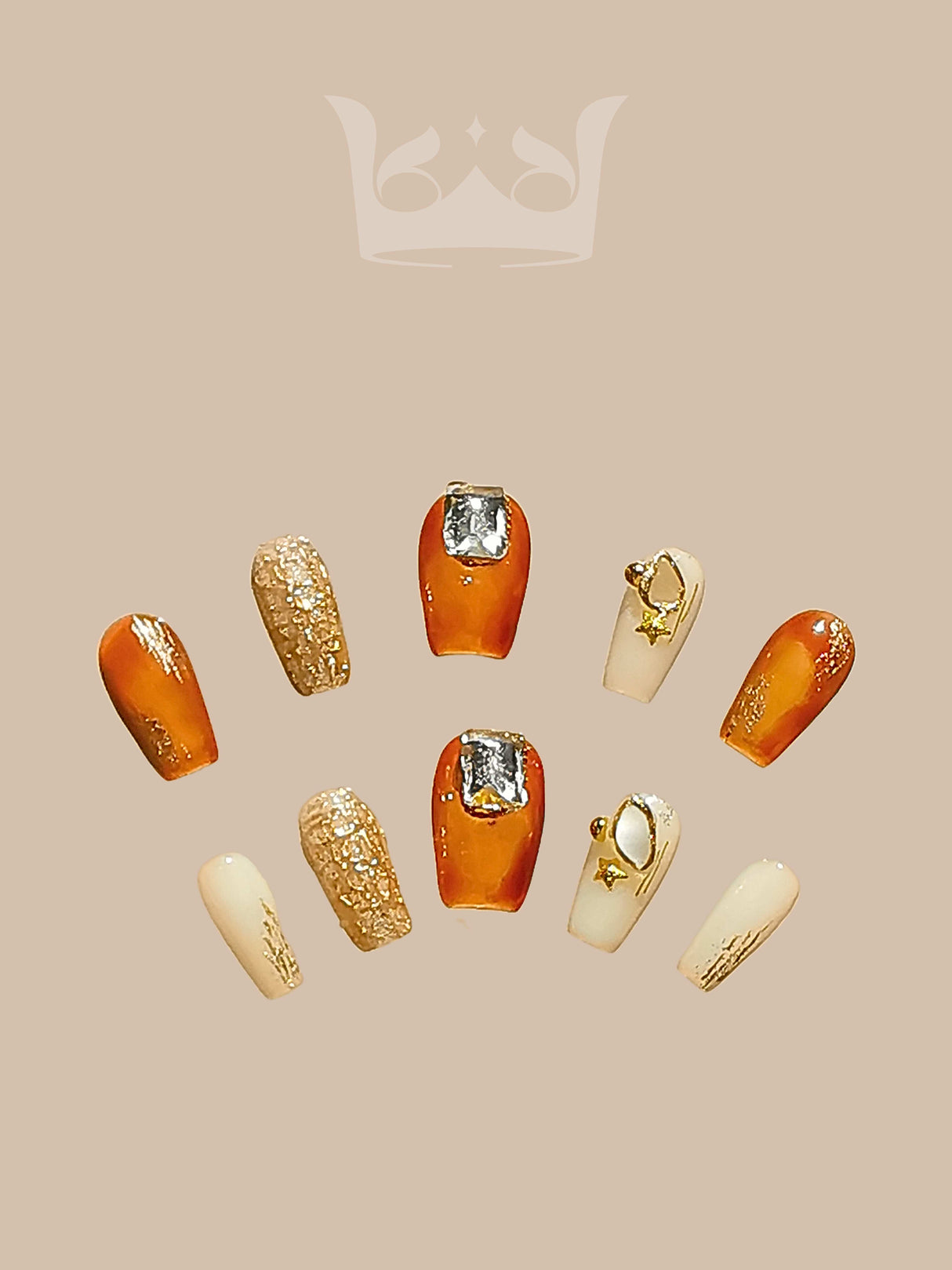 Luxurious and ornate acrylic nails with warm colors, glittery textures, gold foil accents, 3D adornments, and a squared or slightly rounded tip shape for special occasions or fashion statements.