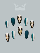 These press-on nails are perfect for making a bold and modern statement in nail art featuring dark teal, gold, honeycomb patterns, a two-tone effect, and glossy finish.
