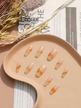 These press-on nails are for enhancing natural nails' appearance, with a unique design marketed towards those valuing creativity and self-expression.