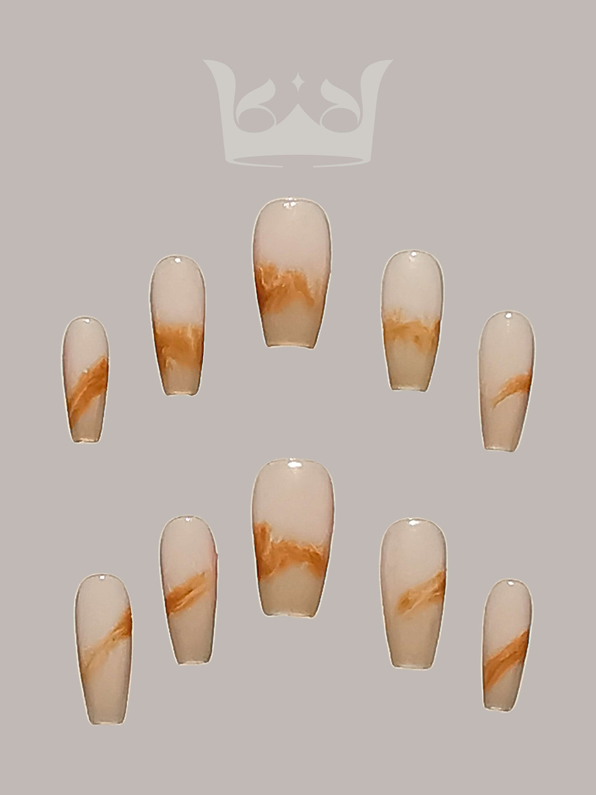 These press-on nails are for cosmetic purposes, with a unique and artistic design including a natural base color, swirls of brown or amber,.They add elegance to any manicure.