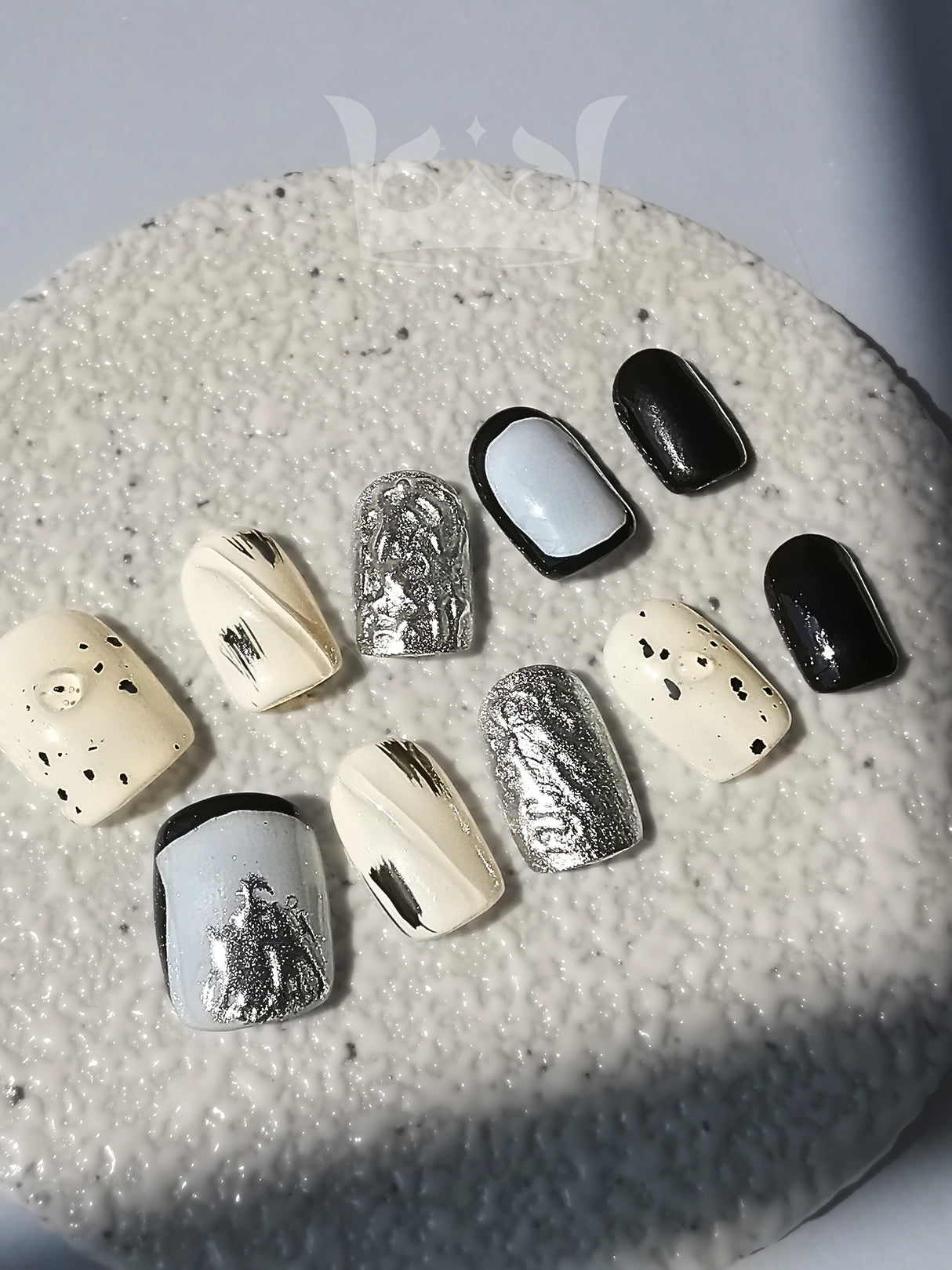 These press-on nails are  for cute purposes, such as for a special occasion or personal expression. They feature a mix of design elements for a modern and artistic look.