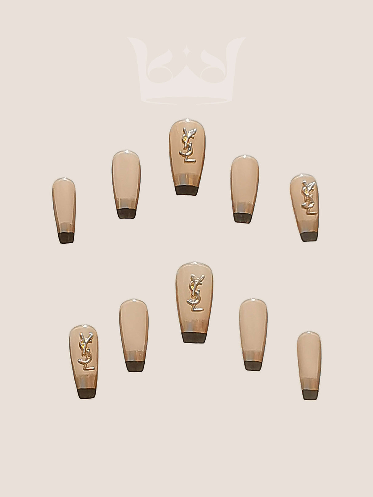 Fashionable and trendy nails with a consistent design theme and gold embellishment, customizable to fit different sizes and shapes, adding sophistication and elegance to the wearer's look.