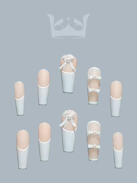 Elegant and fancy nails with French manicure design and cute elements for formal events. Varying lengths and tip shapes for customization.