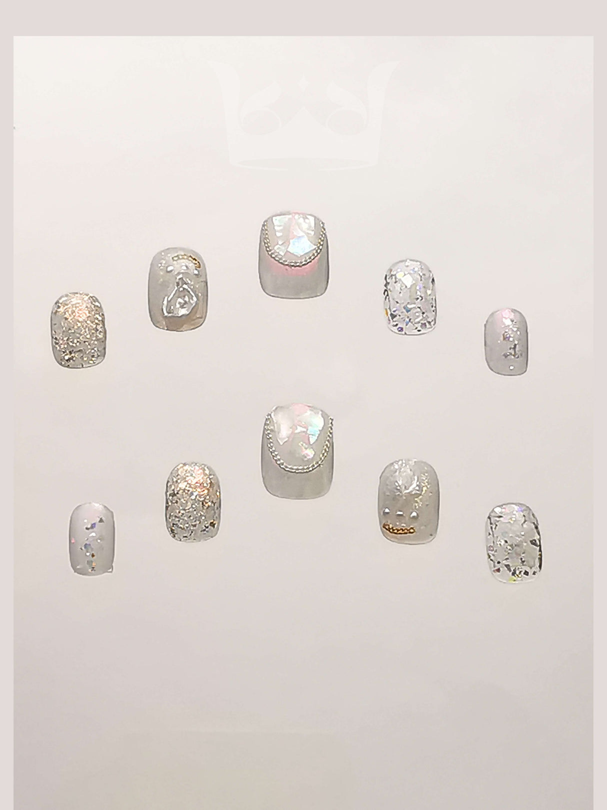 Glitter, iridescent accents, embellishments, and artistic designs make These press-on nails perfect for special occasions. Neutral base colors add elegance.