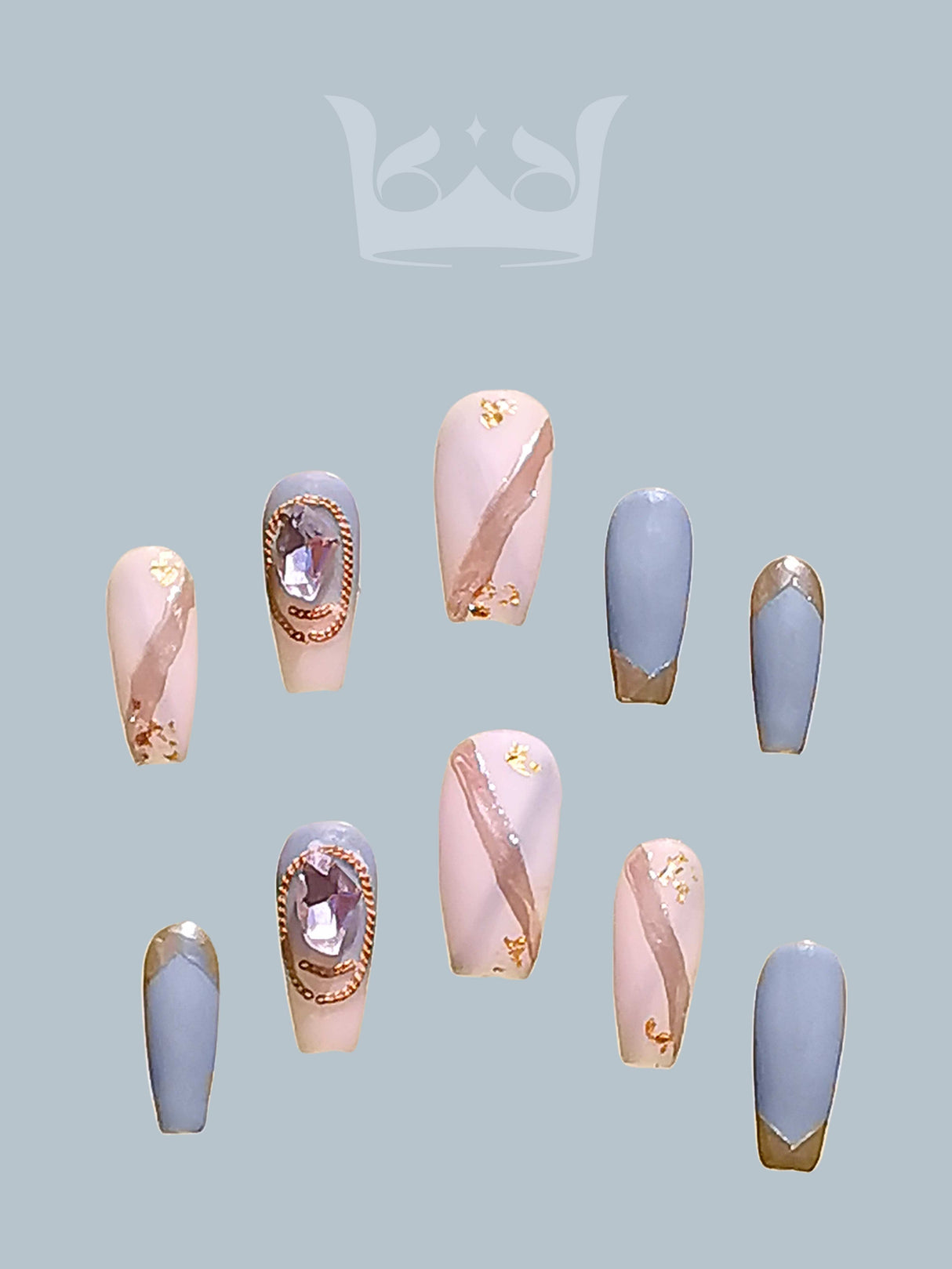 Feminine and elegant nails with pink and blue colors, gold foil accents, and diamonds.  for special occasions or fashion statements. 