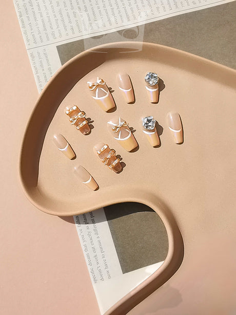 Elegant and minimalist nails for displaying and organizing rings, suitable for jewelry display or photography. Rings feature various designs and harmonious color palette.