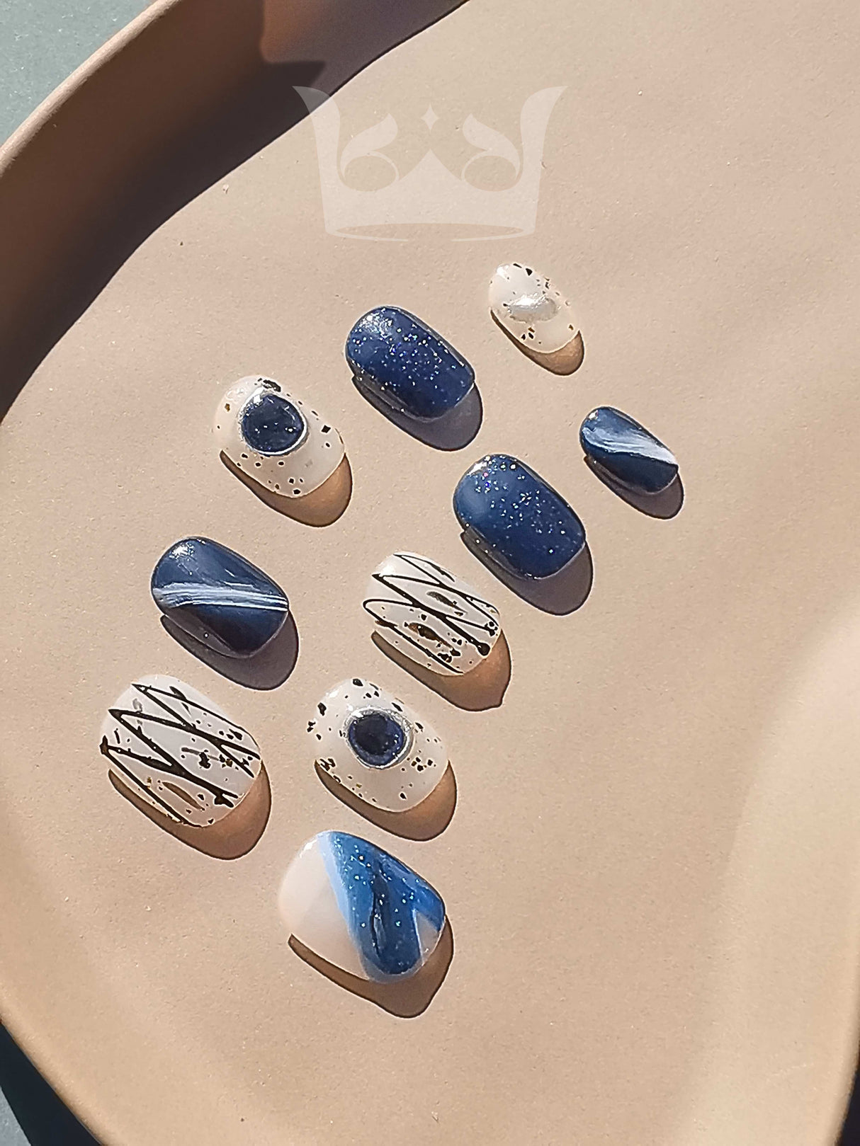 Unclear use case for nails as focus is on painted stones and cute tray. No design elements in nails, only for flat surface crafts.