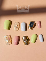 These press-on nails are for nail art, allowing for customization with various colors, finishes, and patterns. The overall aesthetic is playful and trendy.