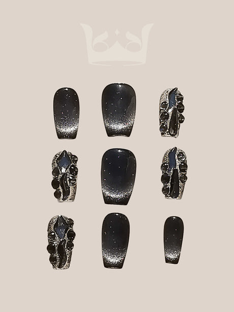 These press-on nails have luxurious designs, with a dark base color, glittery finish, diamonds, and metal-like embellishments. Ideal for special occasions.