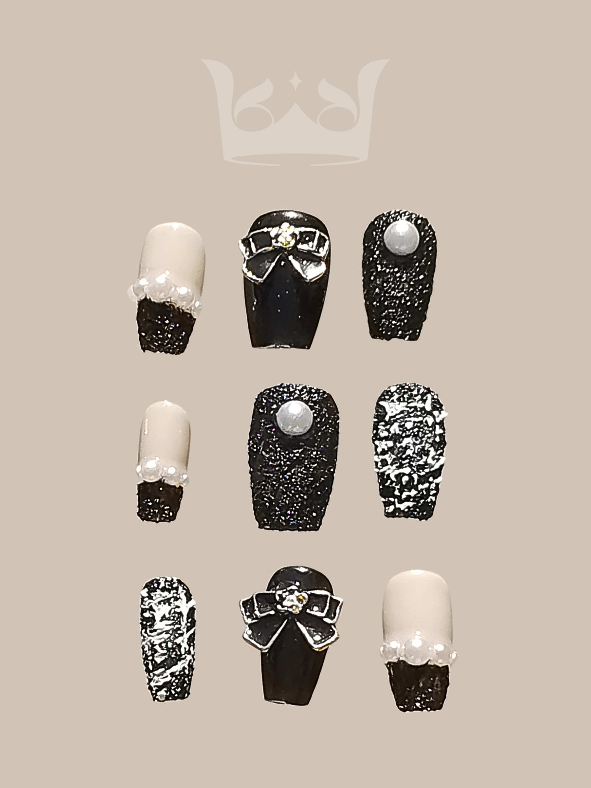 These press-on nails are for nail art enthusiasts. The collection features various designs and embellishments with a black-and-white color scheme, adding a modern and fancy look. 