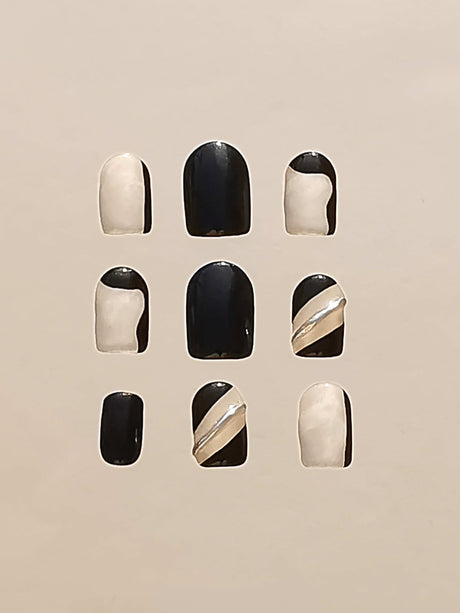 These press-on nails are for cosmetic purposes, with a two-tone design and minimalist style for a modern and fancy look. They can be applied with adhesive or glue.